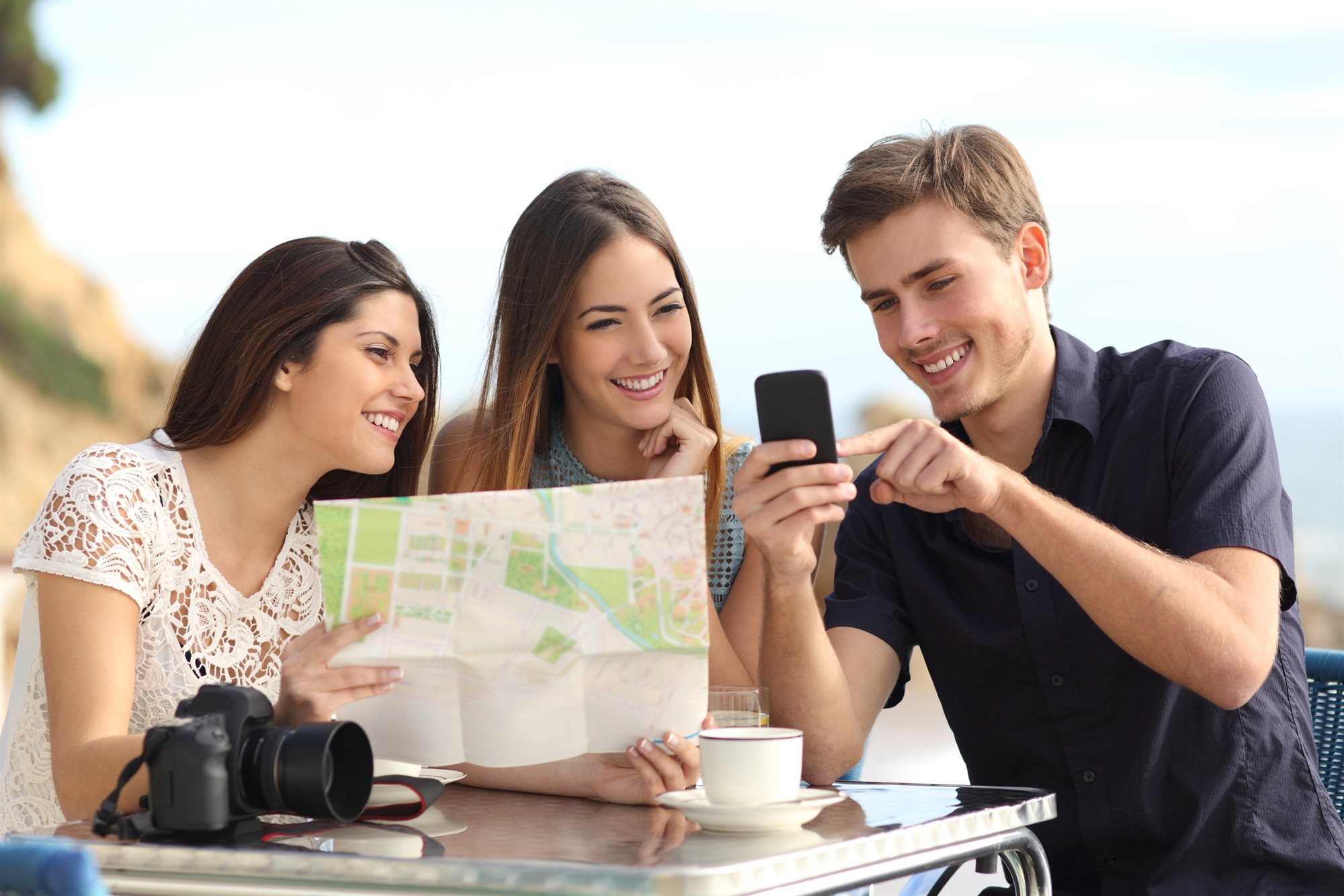 Travelers consulting a map together